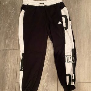 Black and white women’s adidas sweatpants